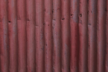 The roof has a wavy texture with a good red color for the background