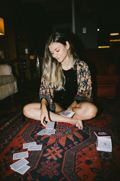 Playing Cards on a Patterned Rug