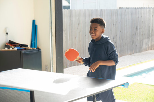 Paying ping pong with grandpa