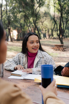 Middle-aged student conversing