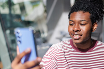 Young black man calling friends