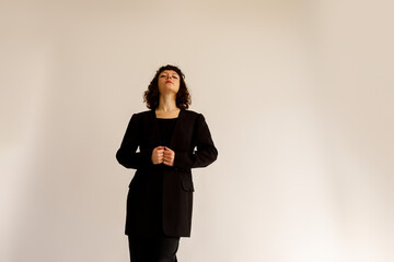 woman in black suit
