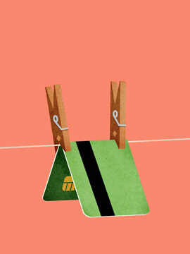 Bank card clipped hanging on line