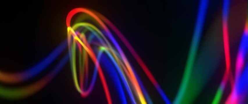Anamorphic video Abstract blur multicolored string of light in black background, Conceptual modern futuristic background
