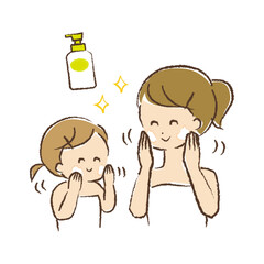 保湿クリームを顔に塗っている母子