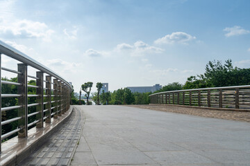 empty, modern square and skyscrapers in modern city