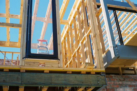Fototapeta Film photo of a detailed view of wooden house framework in Australia