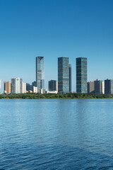 Naklejka premium Lakeside modern office building in China