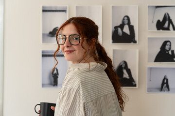 
Photographer with Coffee in Creative Studio