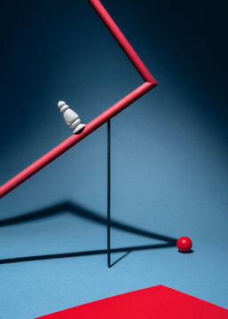 Abstract still life with geometric figures in red and blue colors.