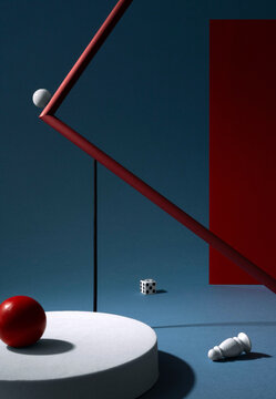 Abstract still life with geometric figures in red and blue colors.