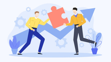 Two men in yellow shirts working together to find a perfect fit in a puzzle ideal for teamwork concepts.