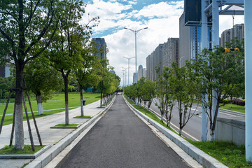 Naklejka premium Empty urban road and buildings in the city