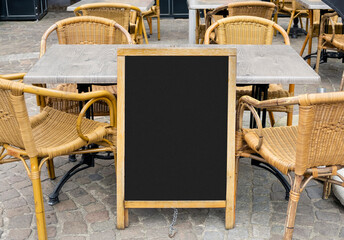 Blank restaurant menu blackboard with empty tables