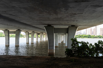 piers under modern bridge outdoor
