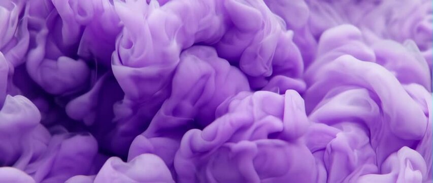 Anamorphic video Flowing ink in water, slow diffusion and swirl effect, soft purple and pink hues, artistic abstract background, high-detail close-up, perfect for beauty ads