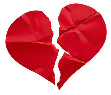 A red crumpled paper heart torn into two pieces against a solid black background with rough edges visible