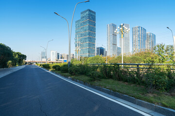 Obraz premium Empty urban road and buildings in the city