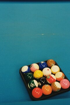 Billiard Balls Set on Blue Pool Table
