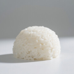 Portion of cooked white rice isolated on white background