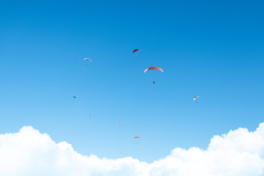 Paragliding flight freedom feel on sunny day