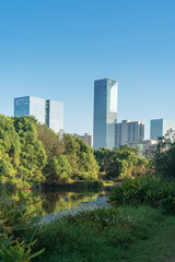 Obraz premium spring park and modern city