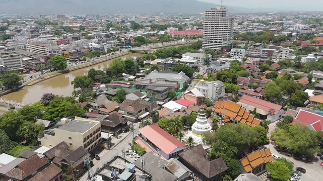 Aerial View Of White Ancient Pagoda At Wat Ket Karam Near Ping River In Chiang Mai, Thailand.