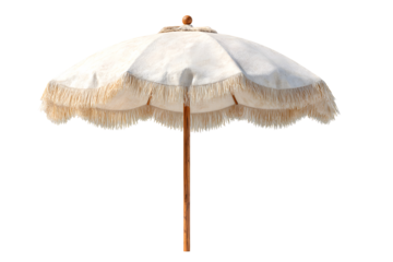 Elegant and aesthetic white beach umbrella with fringe for sun protection isolated against a transparent background