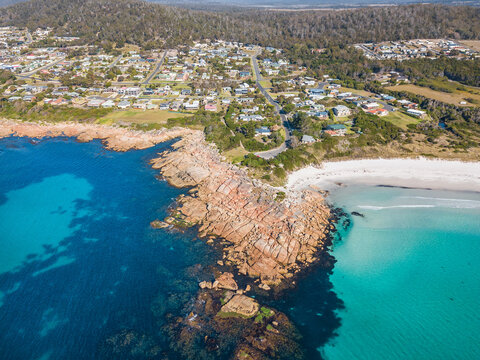 Rocky outcrop in front of a coastal town