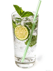 Refreshing Mojito cocktail in a tall clear glass filled with crushed ice, sparkling water, lime wedges and fresh mint leaves.