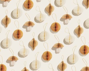 Minimal trend pattern of Festive Paper Christmas Ornaments, vivid beige New Year decorations, honeycomb scandinavian decor on light background, neutral colored monochrome photo, happy holidays layout