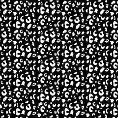 Striking inverted leopard pattern with white spots on a black background. Ideal for bold, stylish projects.