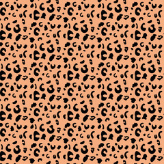  A soft, pastel orange that gives a feminine, delicate touch to the leopard print, while keeping a natural palette.