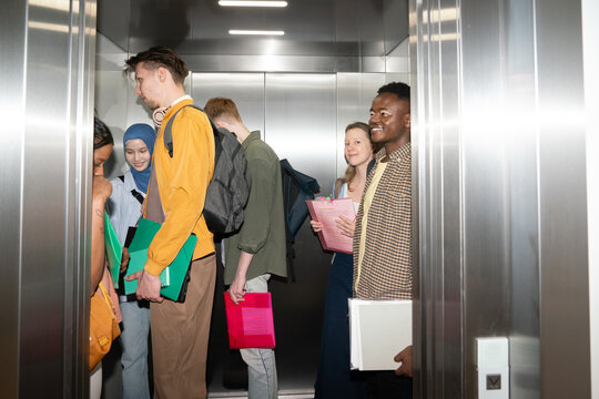 University students in elevator