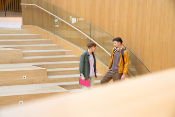 Students conversation at university hall