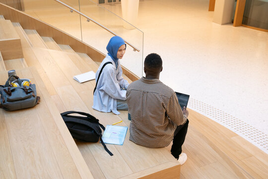 Multicultural Students Conversation in Modern College Space