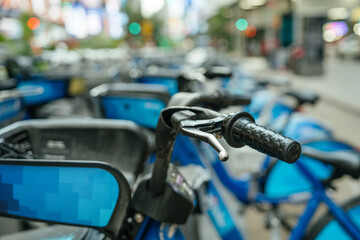 Multiple Citi Bikes are parked on a city street in New York. A symbol of urban transportation and sustainable mobility.