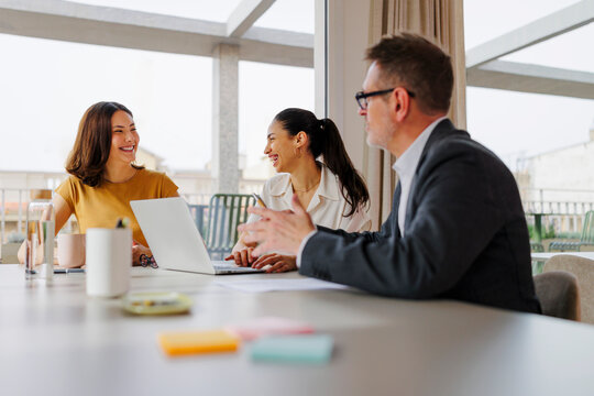 Formal business team discussing during a meeting in the office