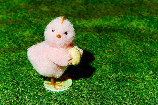 cute pink teddy chick with an easter egg