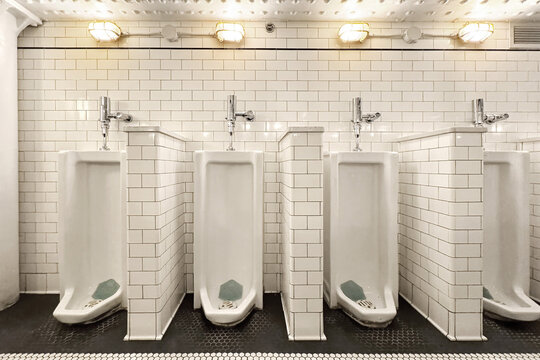 Urinals in public restroom