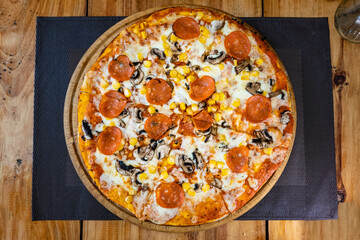 pizza mozzarella pepperoni mushroom and corn