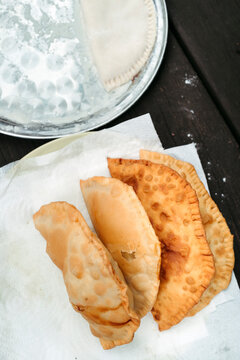 Delicious Empanadas Served Outdoors Under the Sun