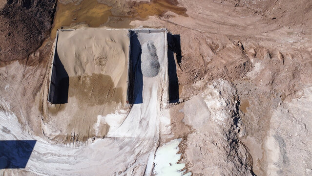 Aerial view of sand and gravel storage mounds