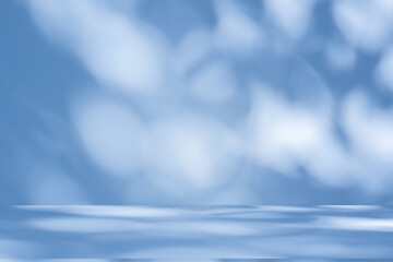 Wall interior background, studio and backdrops show products. with soft light shadow from window color blue and white. background for text insertion and presentation of product	