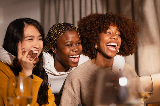 Happy friends enjoying joyful moments together