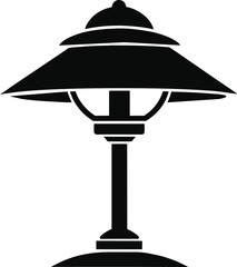 Black table lamp with a shade for home lighting, isolated on a white background