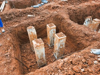Pile foundation structure in deep excavation for heavy building support, showcasing civil engineering and site preparation. Suitable for building foundations, construction, civil engineering theme