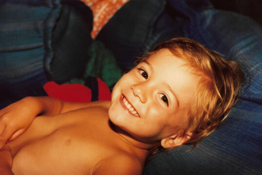 Happy child portrait, vintage 90s photo