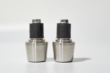 Pair Of Brushed Metal End Caps On White Background