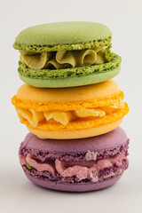 Colorful macarons stacked for dessert display